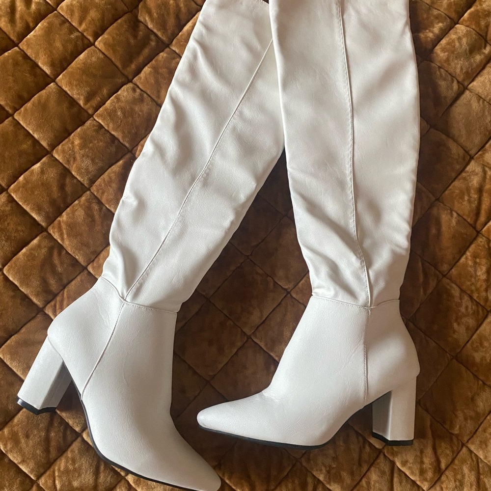 White knee high boots
